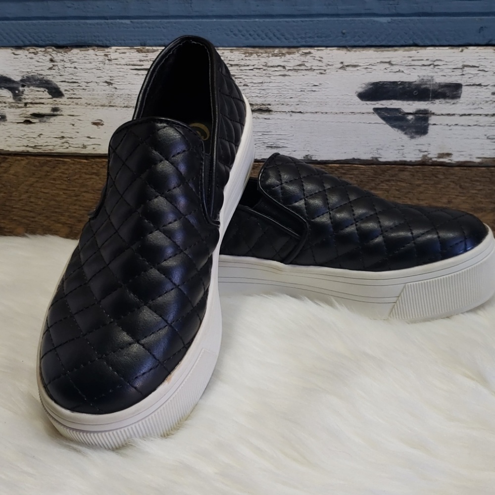 Black platform slip-ons
